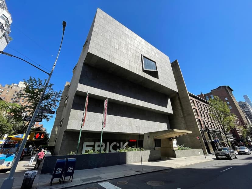 Exterior view of the Frick Collection building at 945 Madison Avenue in New York City on a sunny day